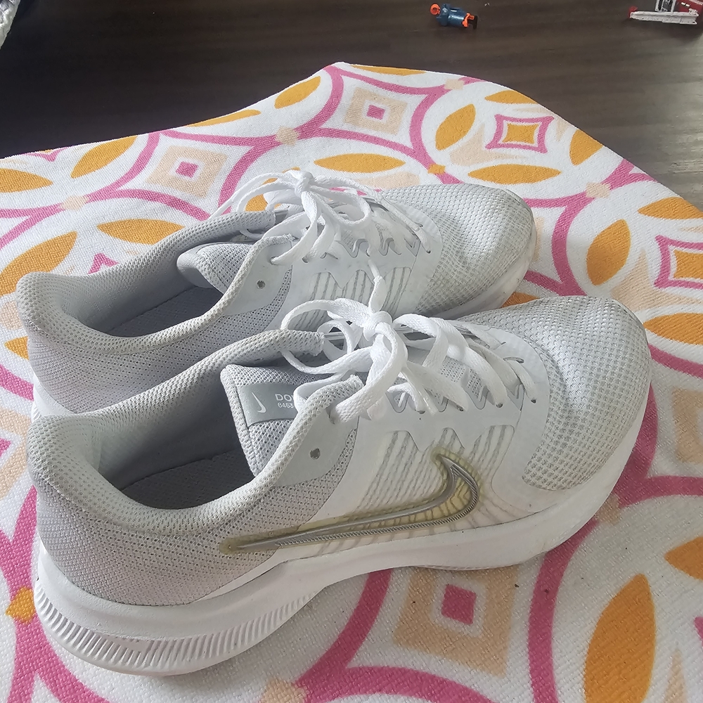 Nike White Sneakers with Gold Details